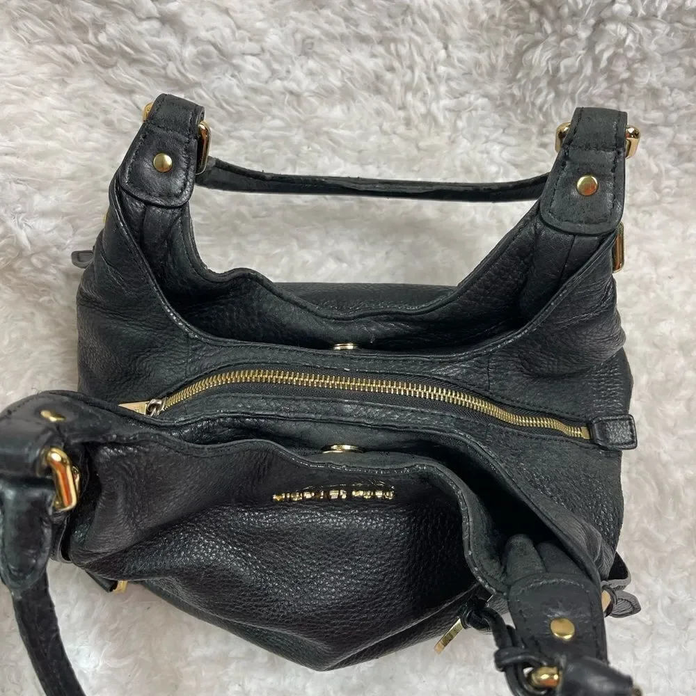 Michael Kors Black Pebble Leather Satchel with gold tone hardwares and accents.